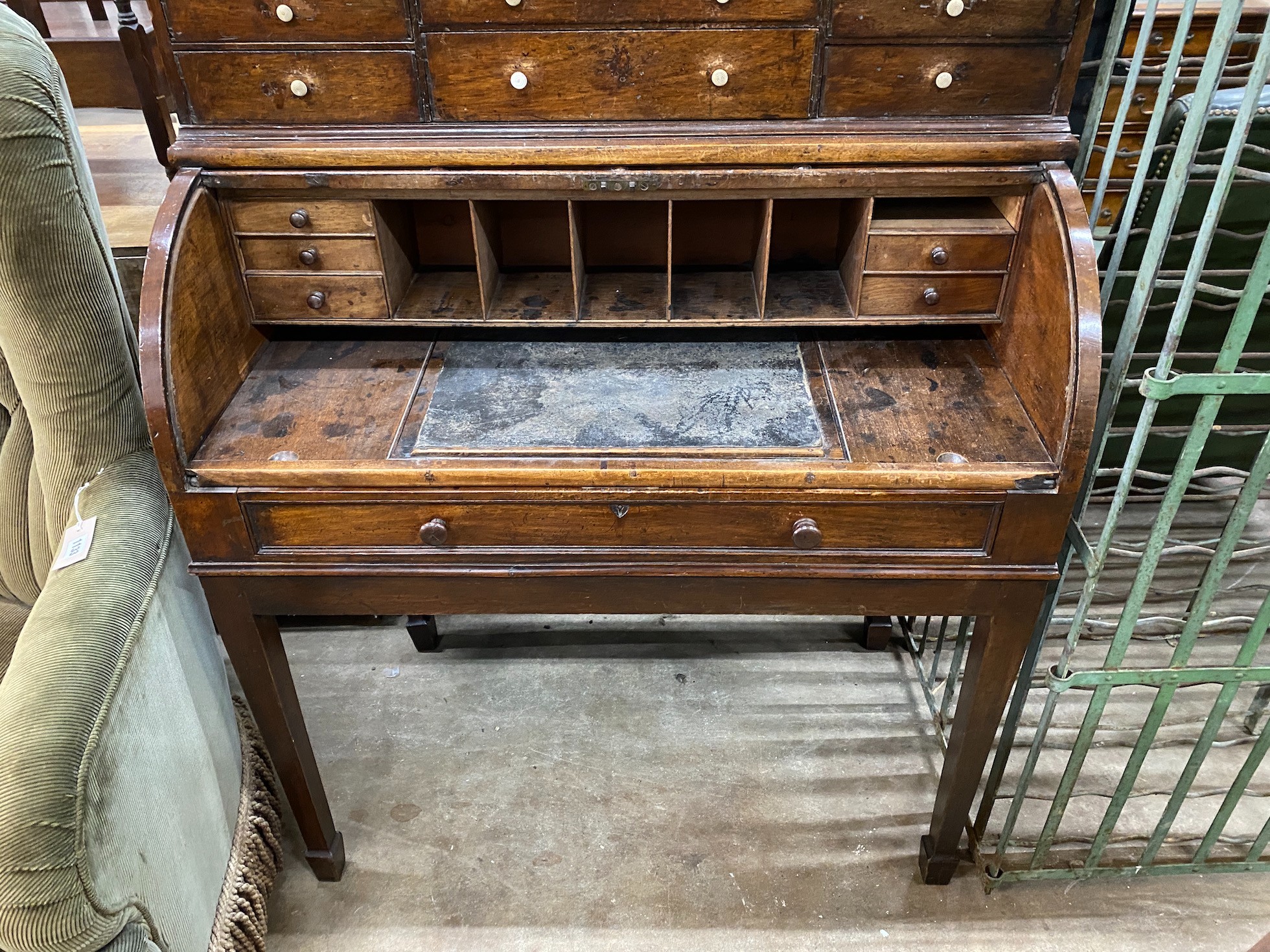 A George III mahogany cylinder bureau with fifteen drawer superstructure, width 92cm, depth 51cm, height 122cm